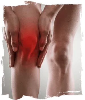 Person holding knee indicating joint pain and inflammation.