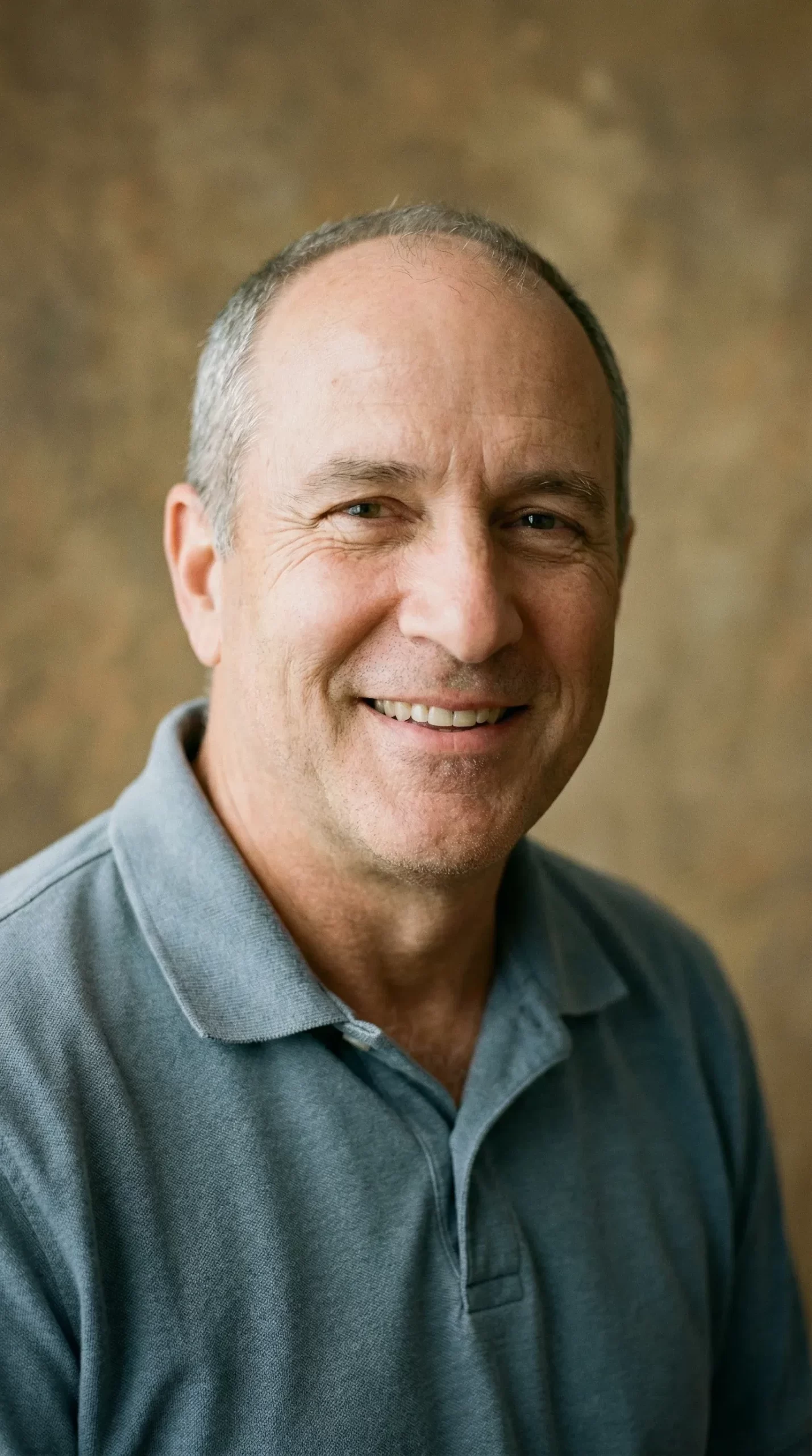 58-year-old man smiling happy after eliminating joint pain with Golden Revive Plus
